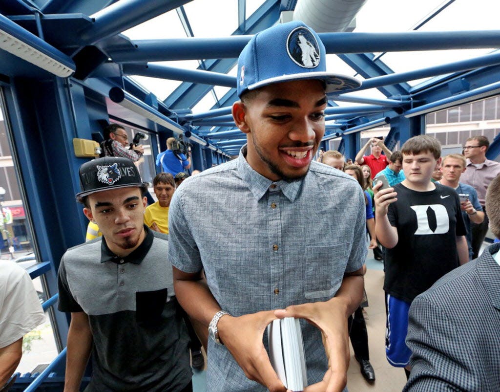 Wolves first-round draft picks Karl-Anthony Towns and Tyus Jones greeted fans on the skyway on their way to Mayo Clinic Square, Friday, June 26, 2015.