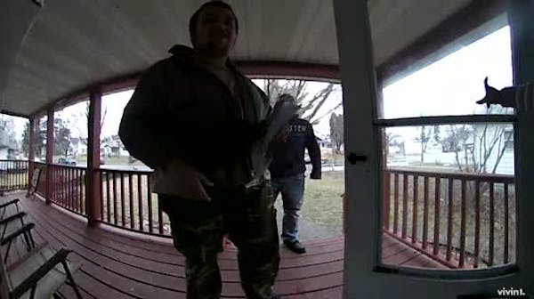 Security camera captures men who swindled Minneapolis woman