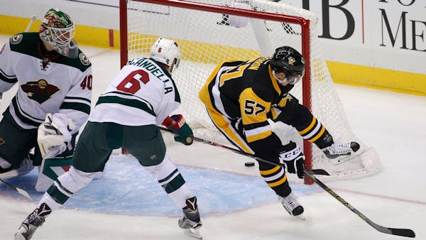 Malkin's dazzling night helps Pittsburgh hold off Wild rally