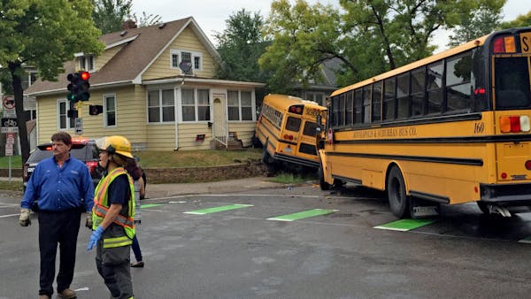Buses crash and hit house in Minneapolis