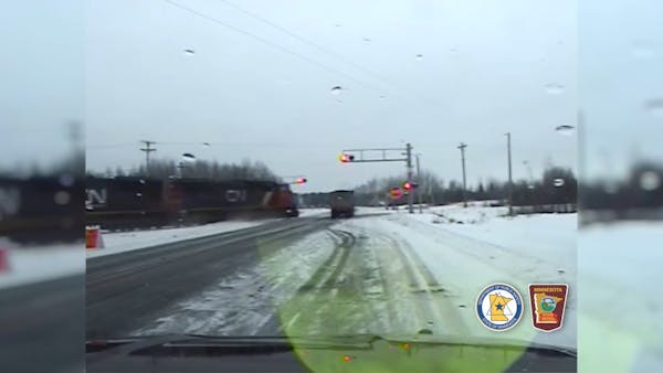 Dash cam video shows train hit a semi-truck