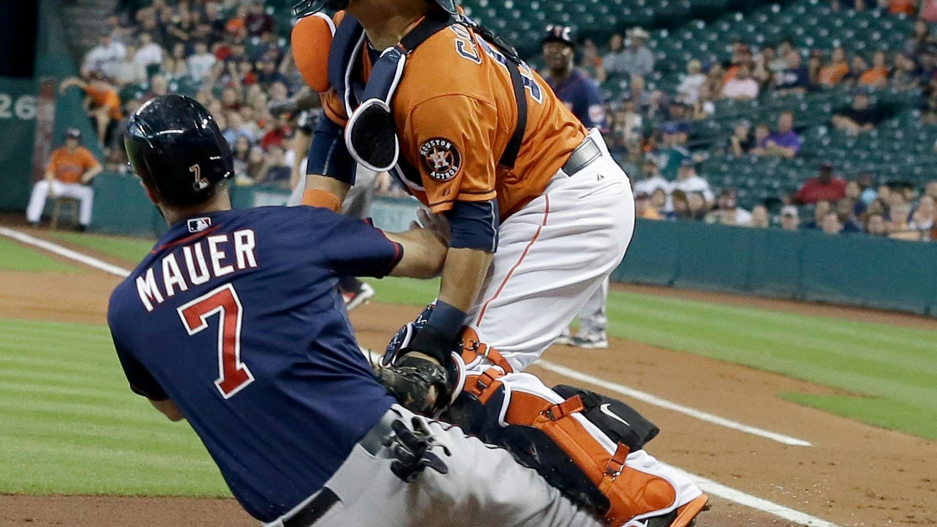 Twins first baseman Joe Mauer thought his out at the plate would be overturned Friday, because "I had nowhere to go" as catcher Hank Conger blocked the baseline.