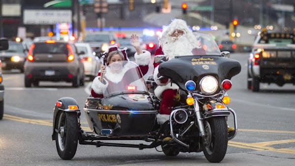 Santa Claus arrives in style for early stop at St. Paul Children's Hospital