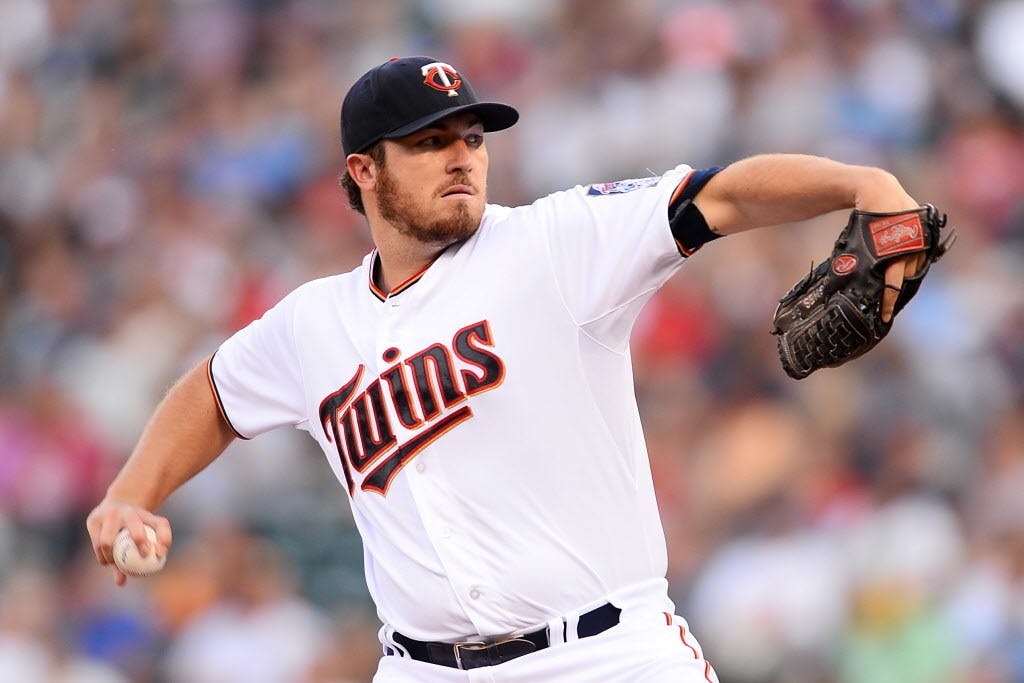 Righthander Phil Hughes as recovered from a sore back and wants to help with the Twins' playoff push