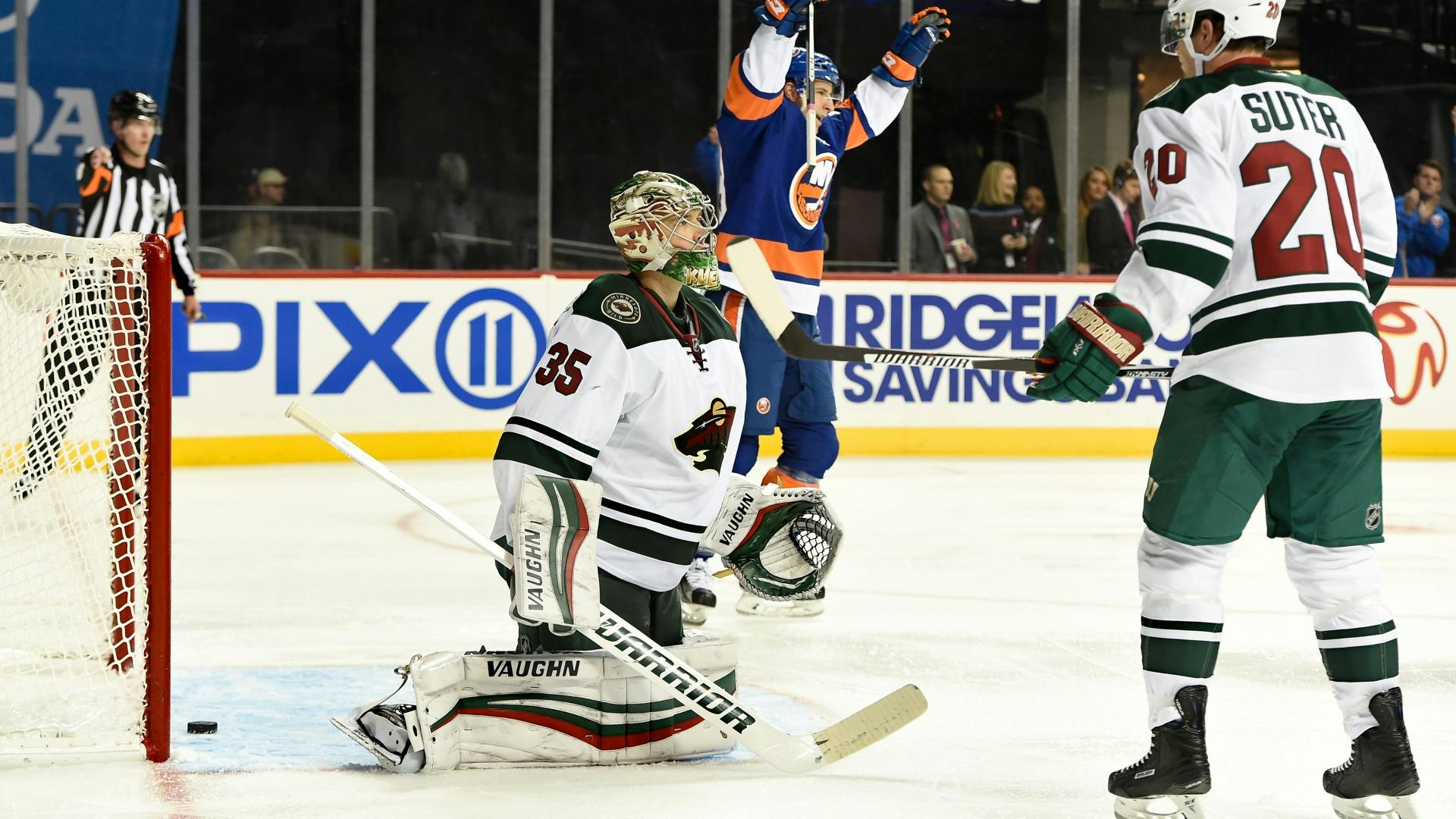 Zach Parise scored twice to reach the 300-goal mark, but it wasn't enough to overcome Darcy Kuemper's poor goaltending performance against the Islanders.