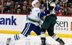 Wild's late frenzy falls short in 3-2 loss to Vancouver