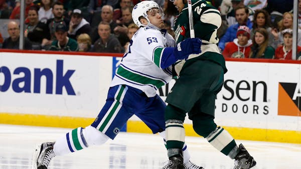 Wild's late frenzy falls short in 3-2 loss to Vancouver