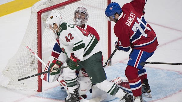 Dubnyk outduels Price as Wild wins ninth in a row