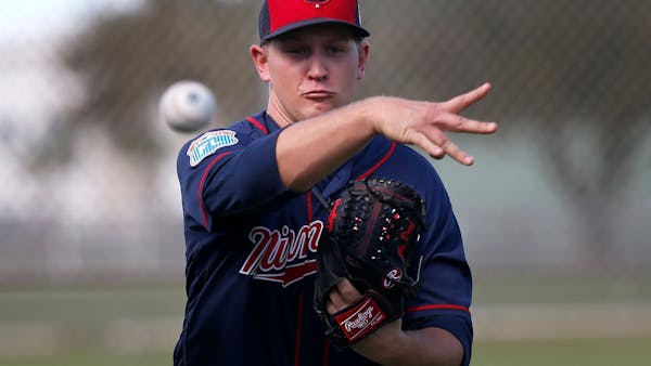 Veterans battling for roster spots lead Twins to victory
