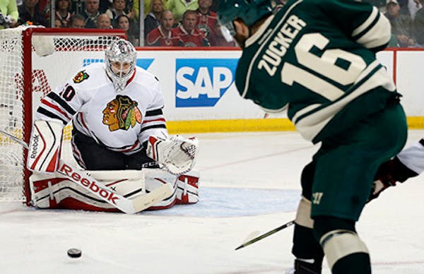 Crawford stops punchless Wild to give Chicago 3-0 lead