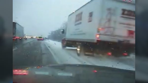 Dash cam video: Truck narrowly misses Crystal police officer