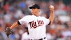 Walker tosses one-hitter as Seattle thumps Twins
