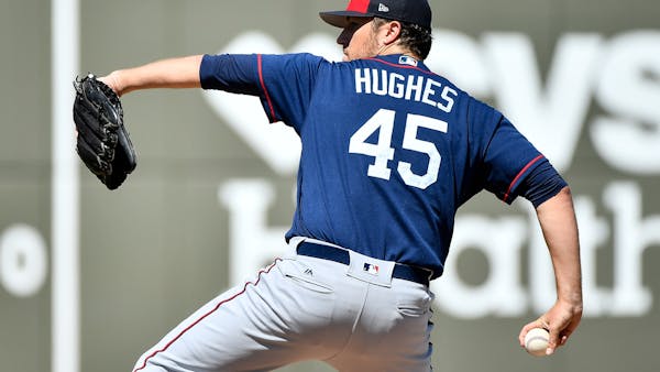 Rough beginning, fast finish for Twins' Hughes