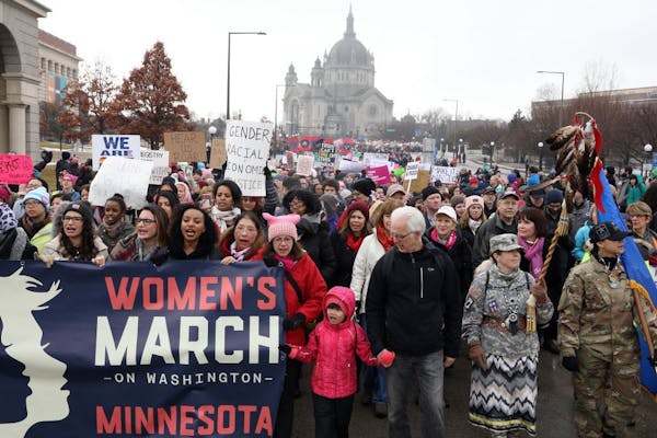 Minnesota women take to streets in St. Paul, D.C.