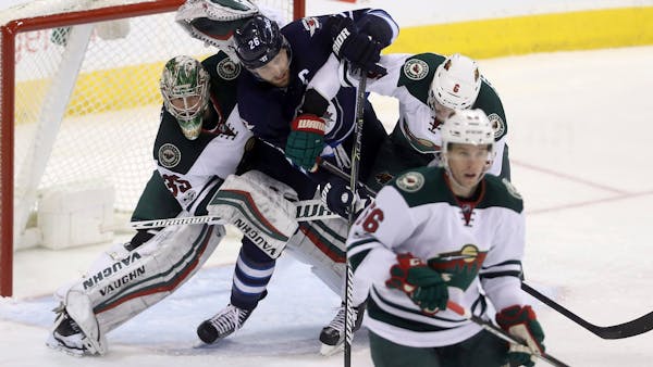 'Lucky' Wild blows three-goal lead, escapes Winnipeg with 6-5 win