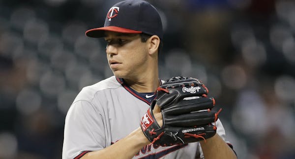 Milone looks sharp in Twins outing