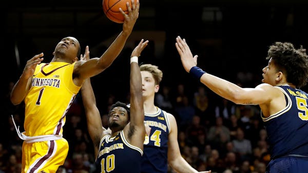 Gophers talk about outlasting Michigan in OT