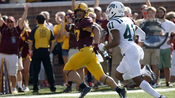 Gophers' Smith and Brooks are friends who love to compete
