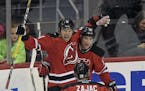 Devils beat Wild, despite rookie's goal in debut