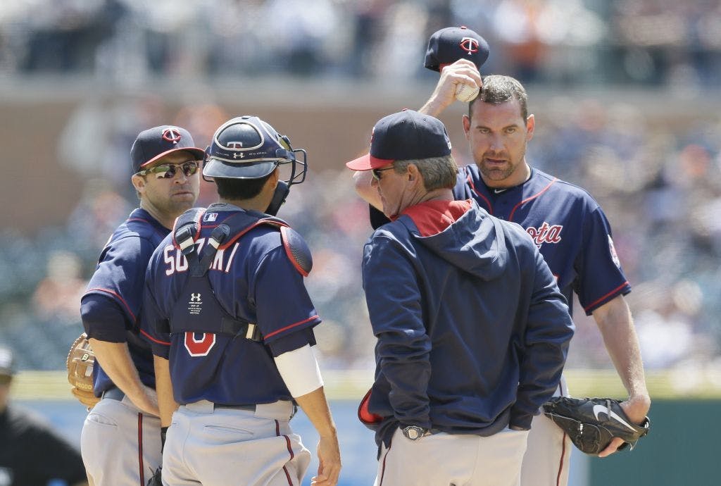 Twins righthander Mike Pelfrey says his pitches didn't sink like they're supposed to during 13-1 loss to Tigers.