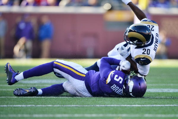 Angry Vikings win in overtime after Bridgewater knocked out of game