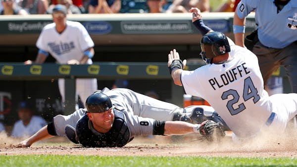 Plouffe's sweet slide ends another Twins losing slide