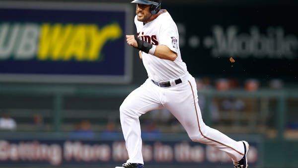 Plouffe shines with the bat, not so much on the bases