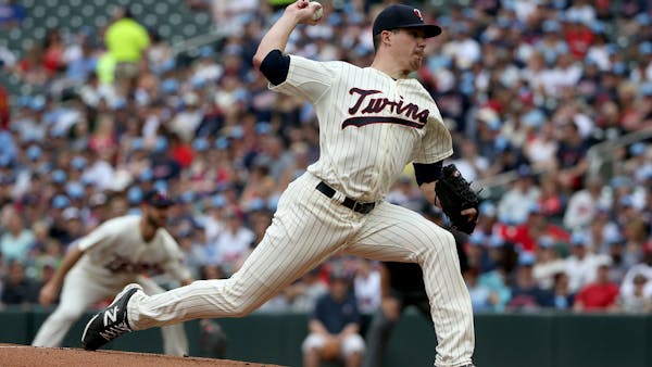 May's day not in vain as Twins rally