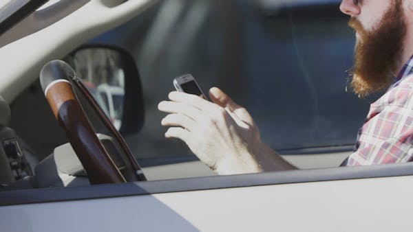 Troopers in unmarked squads cracking down on texting