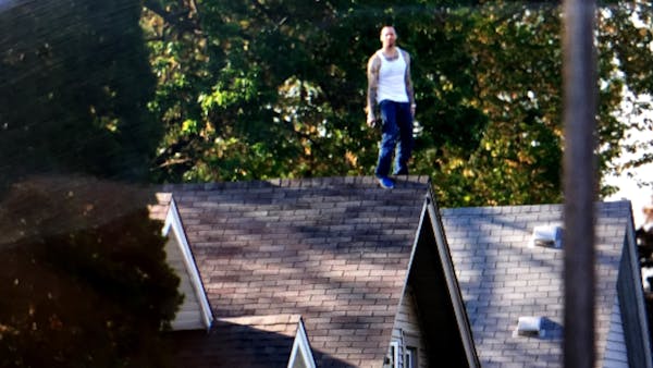 Minneapolis standoff suspect comes off roof after 3-plus hours