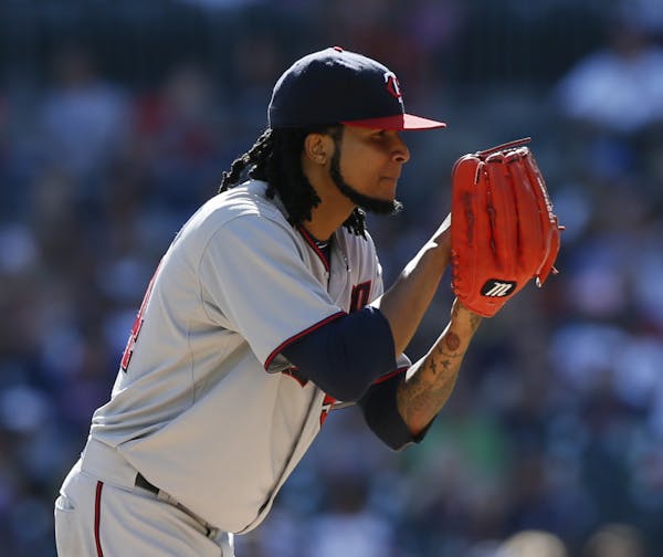 Santana smooth for seven innings in Twins win