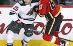 Wild rallies to tie before losing to Flames in shootout