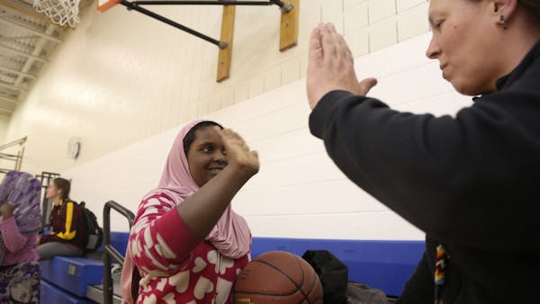 New uniforms for Muslim girls basketball team score big points