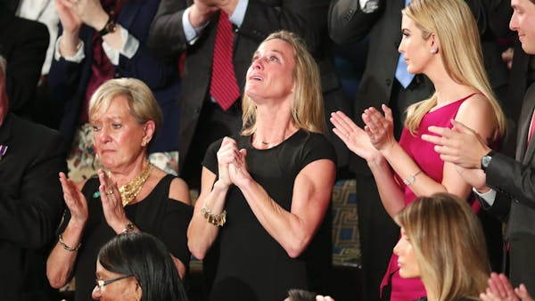 Watch standing ovation for Navy SEAL widow during Trump's speech