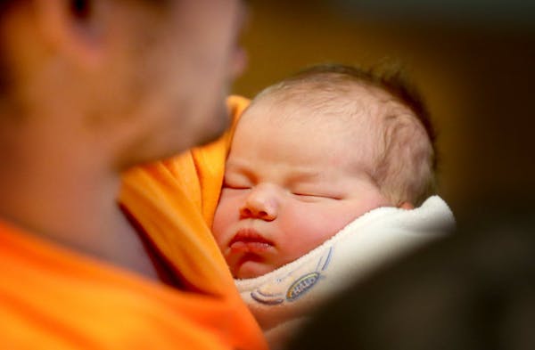 Newborn baby makes unplanned exit on I-94