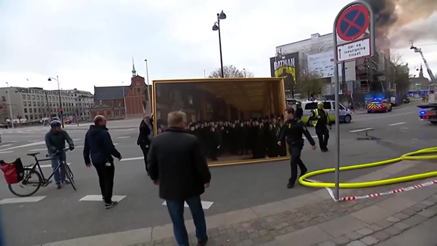 Spire tumbles, famous painting rescued at burning building in Copenhagen