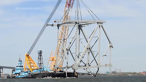 Largest crane on east coast removes massive chunks of fallen Baltimore bridge