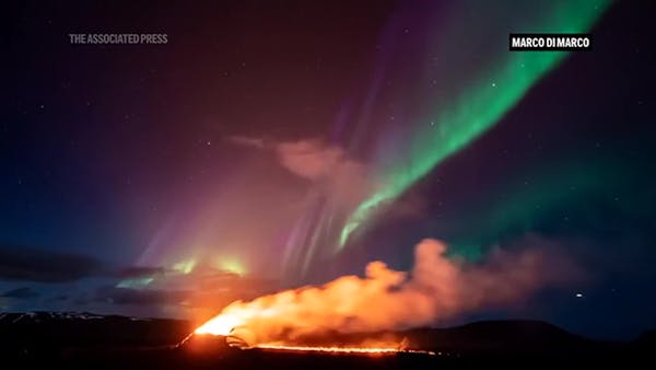 Northern Lights shine over Iceland's erupting volcano