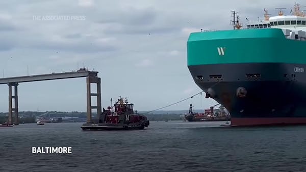 First ships pass through temporary channel past Key bridge wreckage in Baltimore