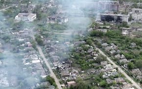 Drone footage shows Ukrainian village battered to ruins as residents flee Russian advance