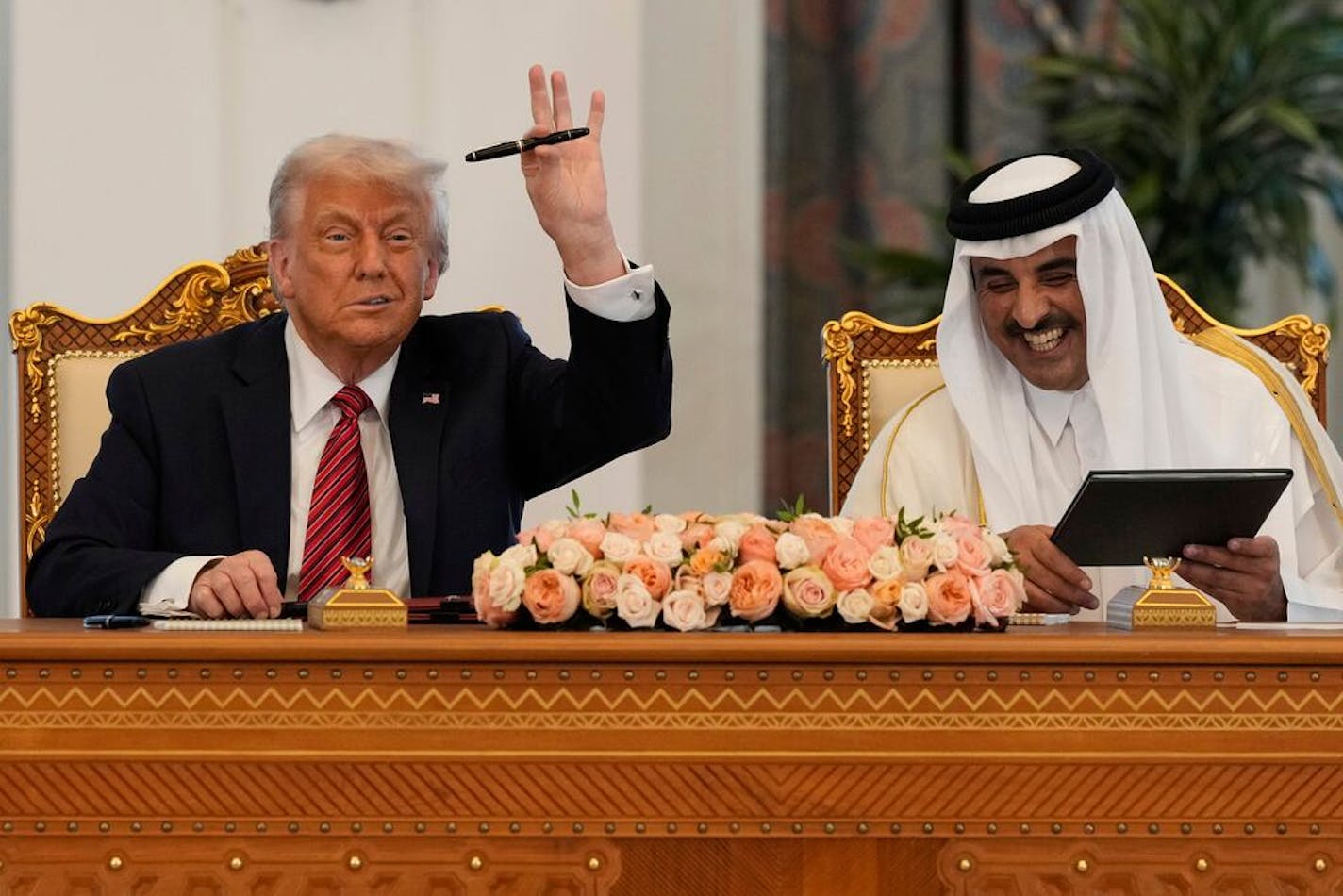 President Trump signs economic deals with Qatar