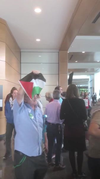 Pro-Palestinian protesters call on the state investment board to divest from Israel
