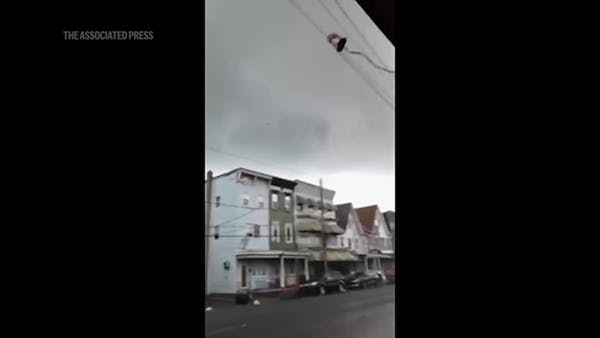 High winds that could be from tornado sweep down street in Pennsylvania