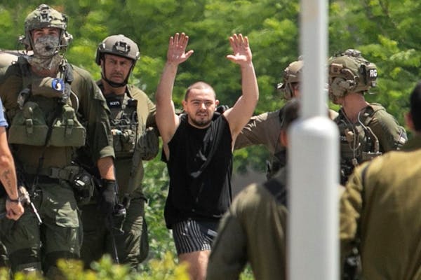 Two rescued Israeli hostages arrive back in Israel