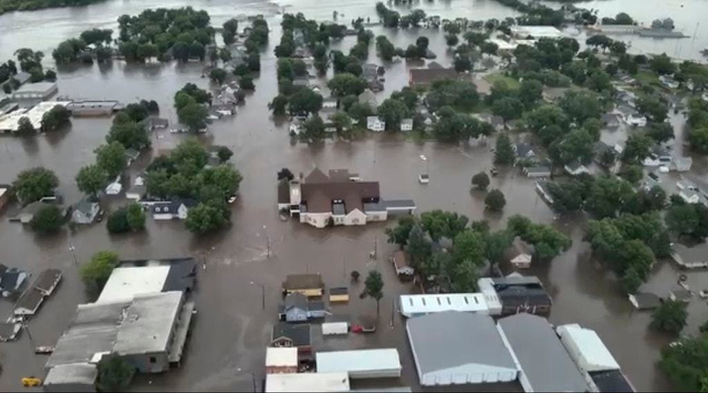 People in Rock Valley, Iowa, were told to evacuate early Saturday as the nearby Rock River could no longer take the rain that has slammed the region.