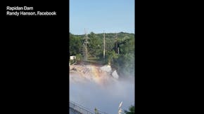 Forceful waters rush through Rapidan Dam in Rapidan Township