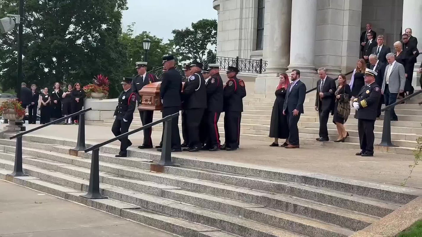 Hortmans caskets escorted from Basilica Saturday