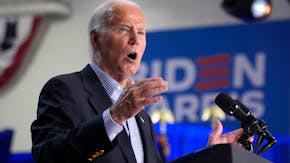 In Wisconsin, Biden tells voters he's staying in the race