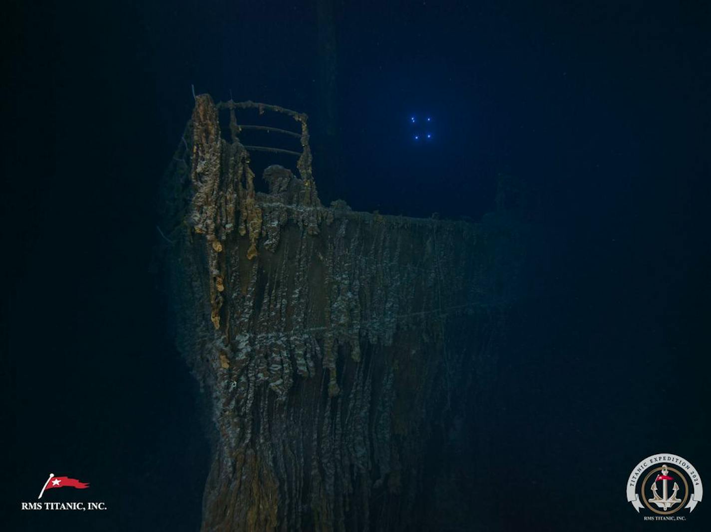 Titanic expedition spots bronze statue, fallen railing