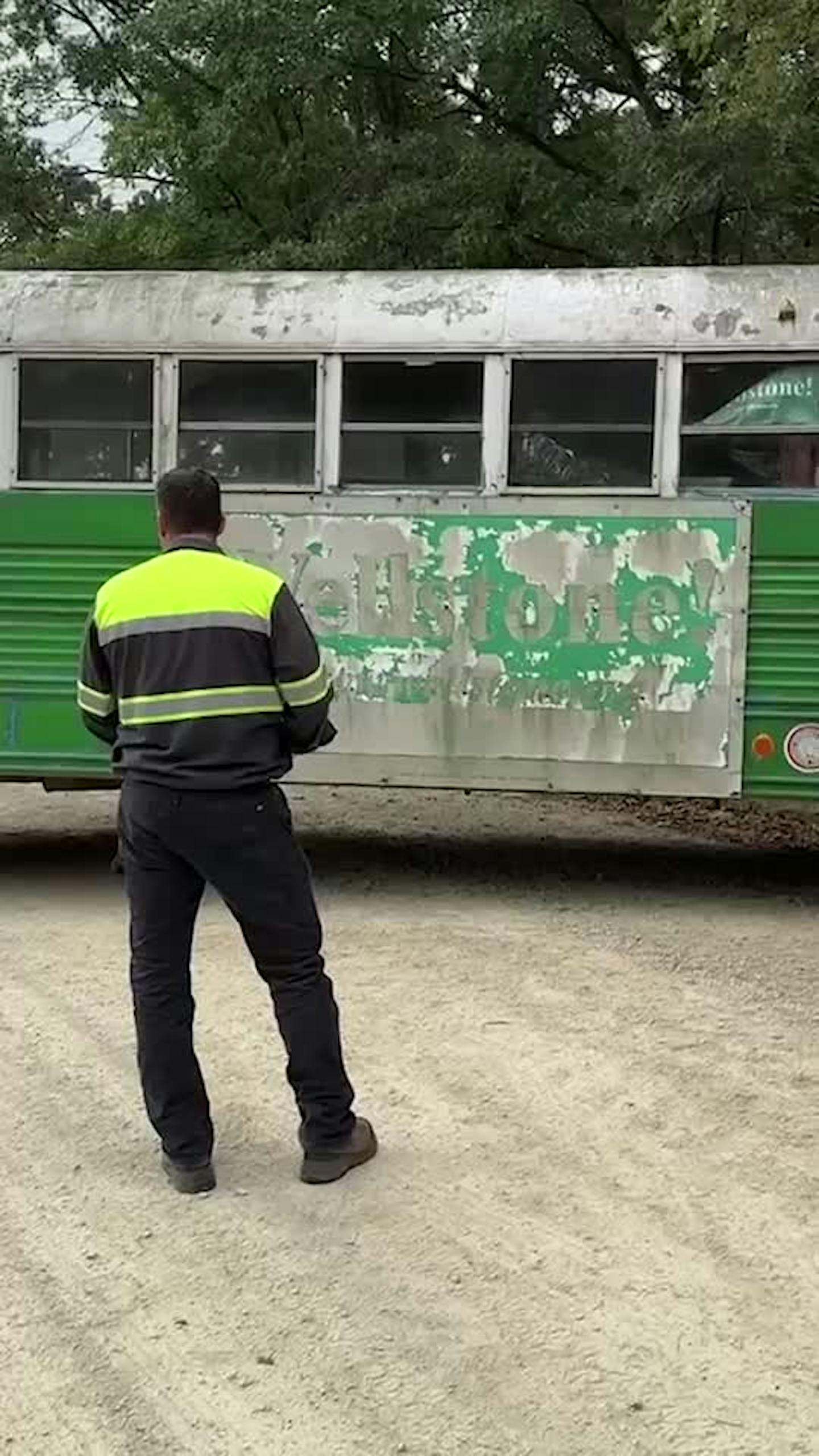 The green Wellstone bus is on the move, getting loaded onto a flatbed and hauled to a garage in Northfield where mechanics will make it roadworthy again.